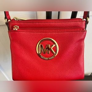 Red/gold Michael Kors crossbody. Authentic